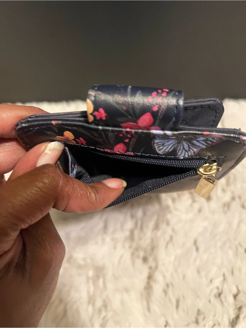 Three piece bundle of two coin, purses, and one small wallet